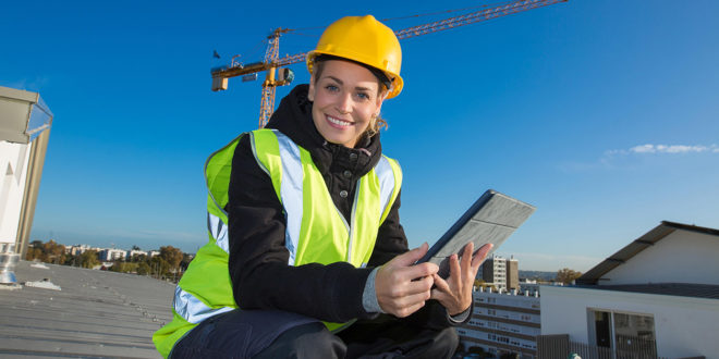 Female worker on rooftop.