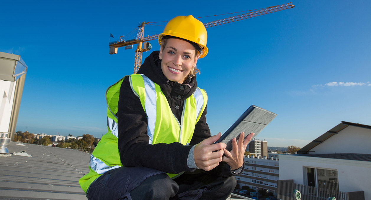 Female worker on rooftop.
