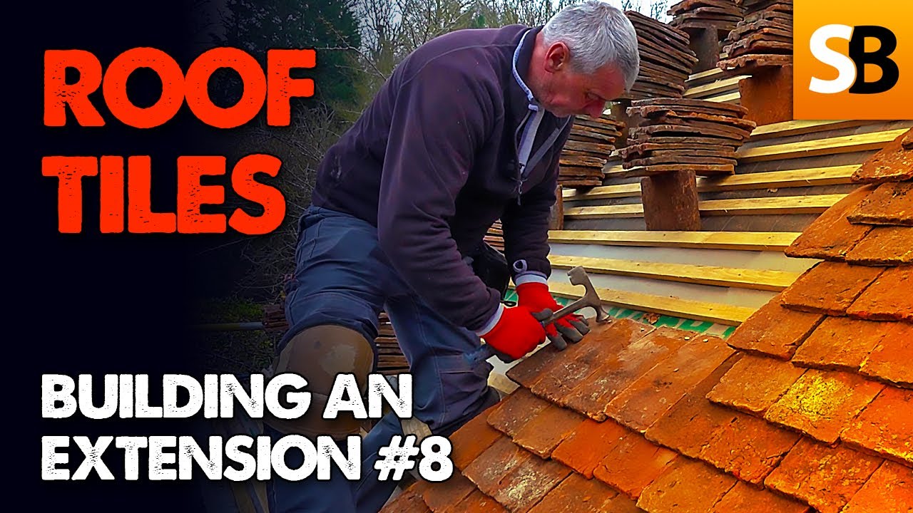 laying clay roof tiles