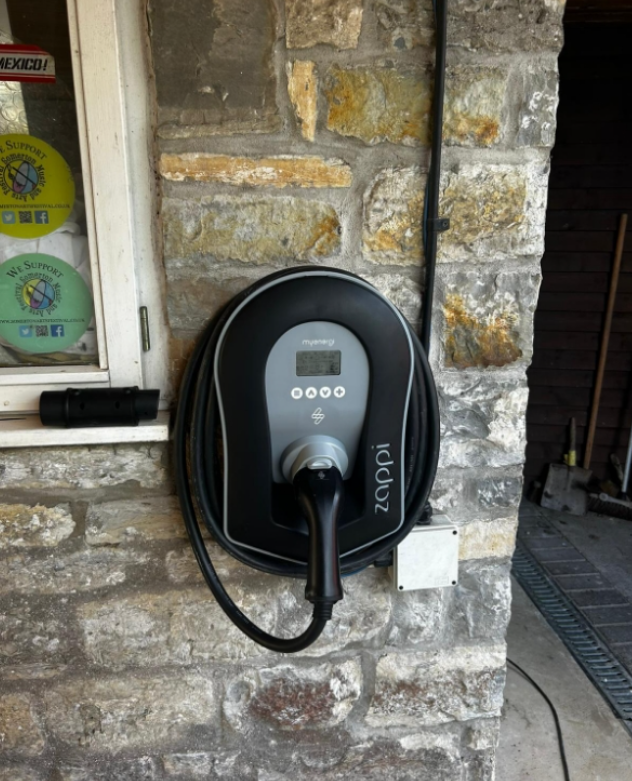 EV Charger Installation Cost – home charging point fitted outside a UK property