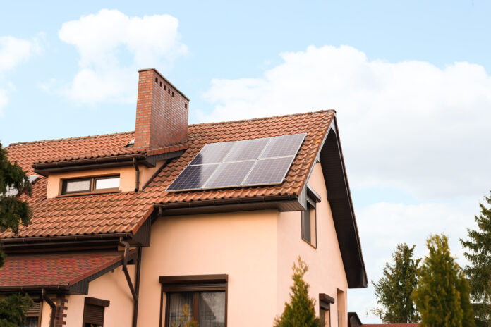 House with solar panels that may need cleaning