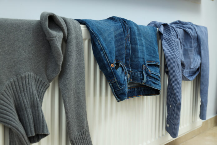 Drying clothes on radiators in a home