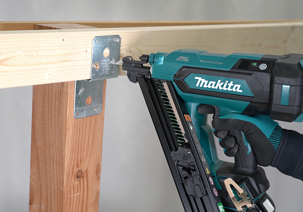 New Makita Nailer Designed for Precise Connector Fixing 1 Makita nailer being used to secure a metal connector